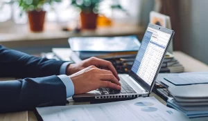 Professional accountant reviewing UAE Pillar Two and DMTT compliance documents for a multinational enterprise in 2026.